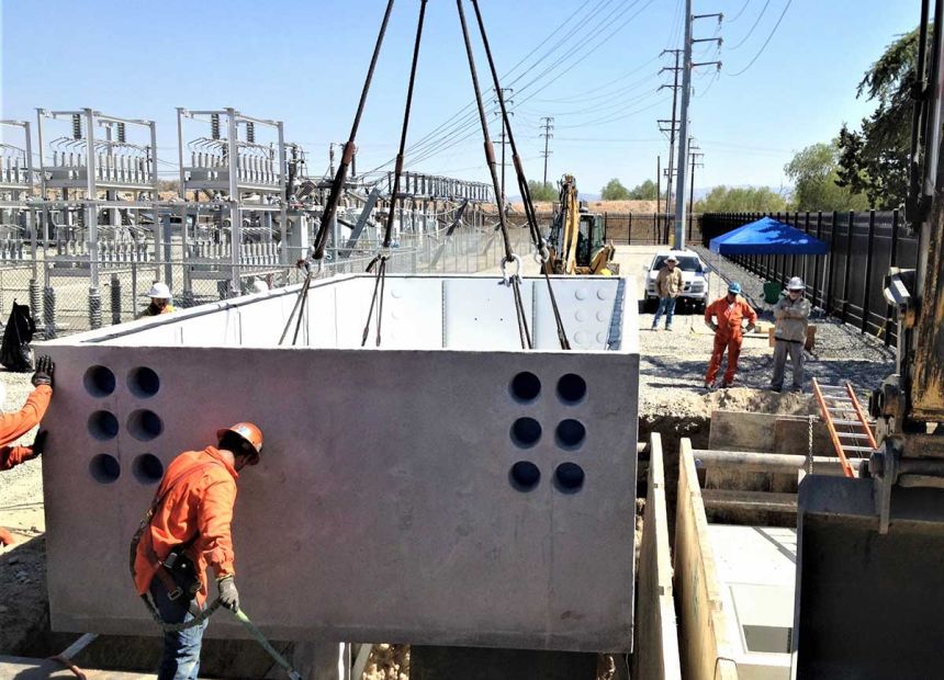 crew installing a vault